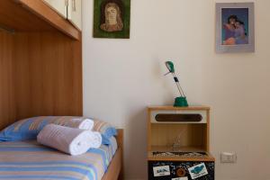 Posteľ alebo postele v izbe v ubytovaní La casa di Ulisse 2