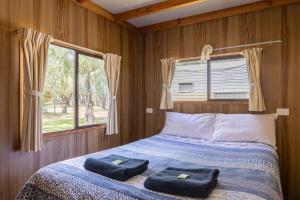 Voodi või voodid majutusasutuse Lazy Days Caravan Park toas