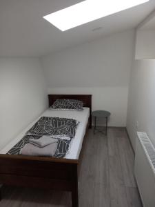 Posteľ alebo postele v izbe v ubytovaní Apartmani Dubrava 2