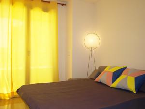 Cama o camas de una habitación en ApartUP Yellow Opera View