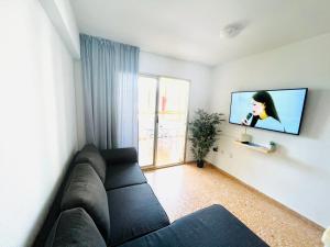 TV tai viihdekeskus majoituspaikassa Mariscal Apartment