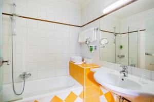 Kúpeľňa v ubytovaní Hotel Das Kohlmais