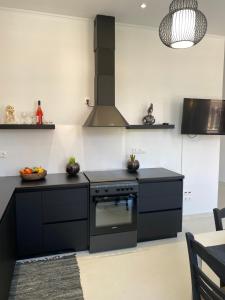 Kuchyň nebo kuchyňský kout v ubytování Artelie apartment