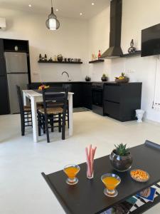 Kuchyň nebo kuchyňský kout v ubytování Artelie apartment