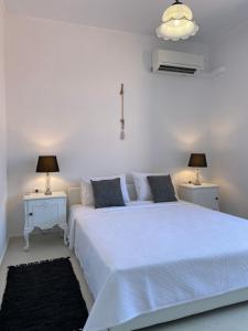 Postel nebo postele na pokoji v ubytování Artelie apartment