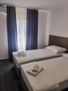 Łóżko lub łóżka w pokoju w obiekcie D8 B&B