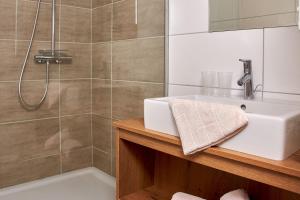Ein Badezimmer in der Unterkunft Gasthof Hotel Post