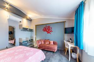 Un televizor și/sau centru de divertisment la RELAIS IL CORALLO