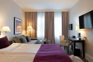 Postel nebo postele na pokoji v ubytování Elite Palace Hotel & Spa + 37 fotografií