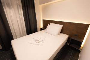 Łóżko lub łóżka w pokoju w obiekcie D8 B&B