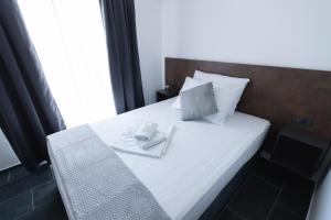 Łóżko lub łóżka w pokoju w obiekcie D8 B&B