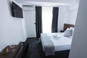 Łóżko lub łóżka w pokoju w obiekcie D8 B&B