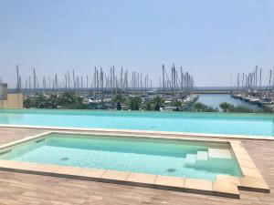 The swimming pool at or close to Aregai Marina Exclusive Seaside Apartments