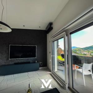 TV a/nebo společenská místnost v ubytování Villa Mia Sarajevo