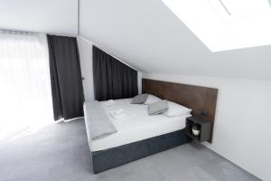 Łóżko lub łóżka w pokoju w obiekcie D8 B&B