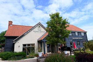 a building with a sign that reads the pawn house at Penny Hedge, Whitby by Marston's Inns in Whitby