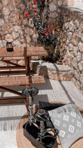 a remote control sitting on top of a table at Fiore di Flora in Archangelos