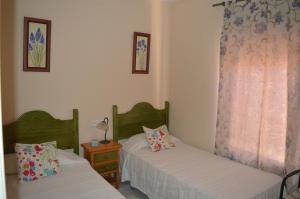 Posteľ alebo postele v izbe v ubytovaní Villa Dulce Algarve Golf and Beach