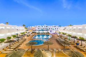 an aerial view of the resort with chairs and umbrellas at Las Adelfas in Puerto del Carmen