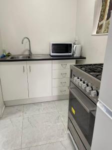 Kuchyň nebo kuchyňský kout v ubytování Dash Motel, Papakura + 27 fotografií