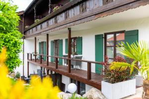 Balkón nebo terasa v ubytování Das Maximilian - Feines Landhotel am Schliersee