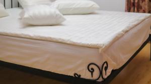 Postel nebo postele na pokoji v ubytování Nur Guest House