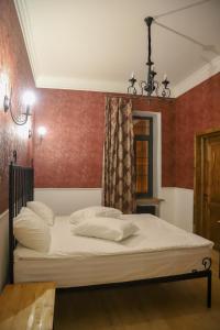 Postel nebo postele na pokoji v ubytování Nur Guest House