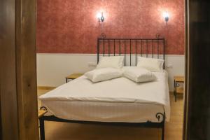 Postel nebo postele na pokoji v ubytování Nur Guest House