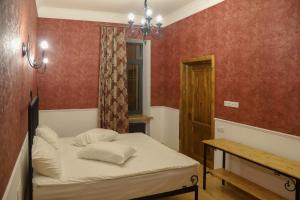 Postel nebo postele na pokoji v ubytování Nur Guest House