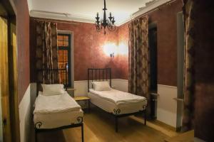 Postel nebo postele na pokoji v ubytování Nur Guest House