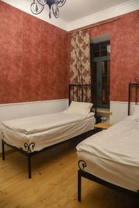 Postel nebo postele na pokoji v ubytování Nur Guest House