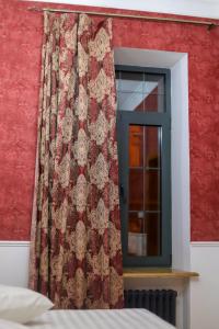 Postel nebo postele na pokoji v ubytování Nur Guest House