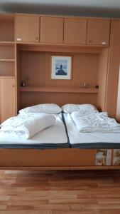 Postel nebo postele na pokoji v ubytování Travemünde am Hafen