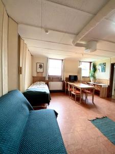 TV a/nebo společenská místnost v ubytování Lumi Guest House