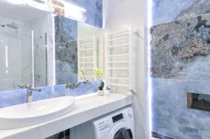 Phòng tắm tại Apartament z widokiem na morze- USTRONIE APARTMENTS Nadmorski Luksus Apartamenty