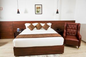 Ένα ή περισσότερα κρεβάτια σε δωμάτιο στο THE RUNWAY HOTEL