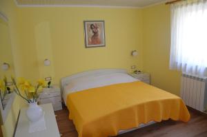 Posteľ alebo postele v izbe v ubytovaní Villa Fragola - Holiday house with large garden + 37 fotografií