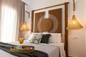 Säng eller sängar i ett rum på Akropolis Village Complex of Luxury Residence