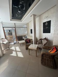 a large living room with couches and a table at Time out in Sozopol