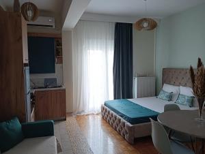 Ένα ή περισσότερα κρεβάτια σε δωμάτιο στο DREAM HOME