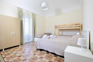 Posteľ alebo postele v izbe v ubytovaní Villa Polara