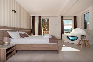 מיטה או מיטות בחדר ב-Green Space Hotel