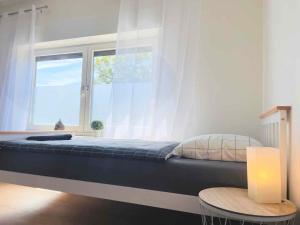Ένα ή περισσότερα κρεβάτια σε δωμάτιο στο Moderne Apartments Bedburg-Hau