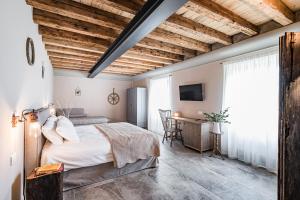 Postel nebo postele na pokoji v ubytování Borgo Gradis'ciutta