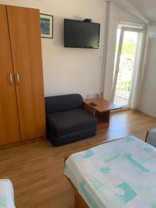 TV a/nebo společenská místnost v ubytování Room Ivana