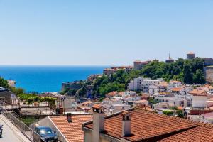 a view of a city with the ocean in the background at Castello Apartments in Ulcinj