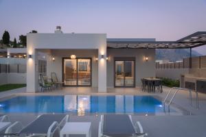 The swimming pool at or close to Exquisite Villas with Enchanting Surroundings, By ThinkVilla