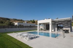 The swimming pool at or close to Exquisite Villas with Enchanting Surroundings, By ThinkVilla