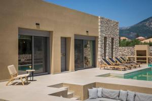 The swimming pool at or close to Villa Iokasti - Ionian Treasure Villas