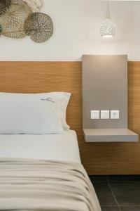 A bed or beds in a room at Villa Iokasti - Ionian Treasure Villas